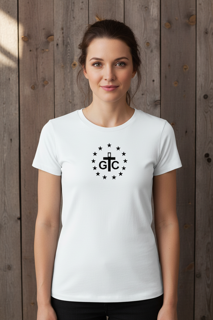Female model wearing exact white G&C t-shirt against rustic wood